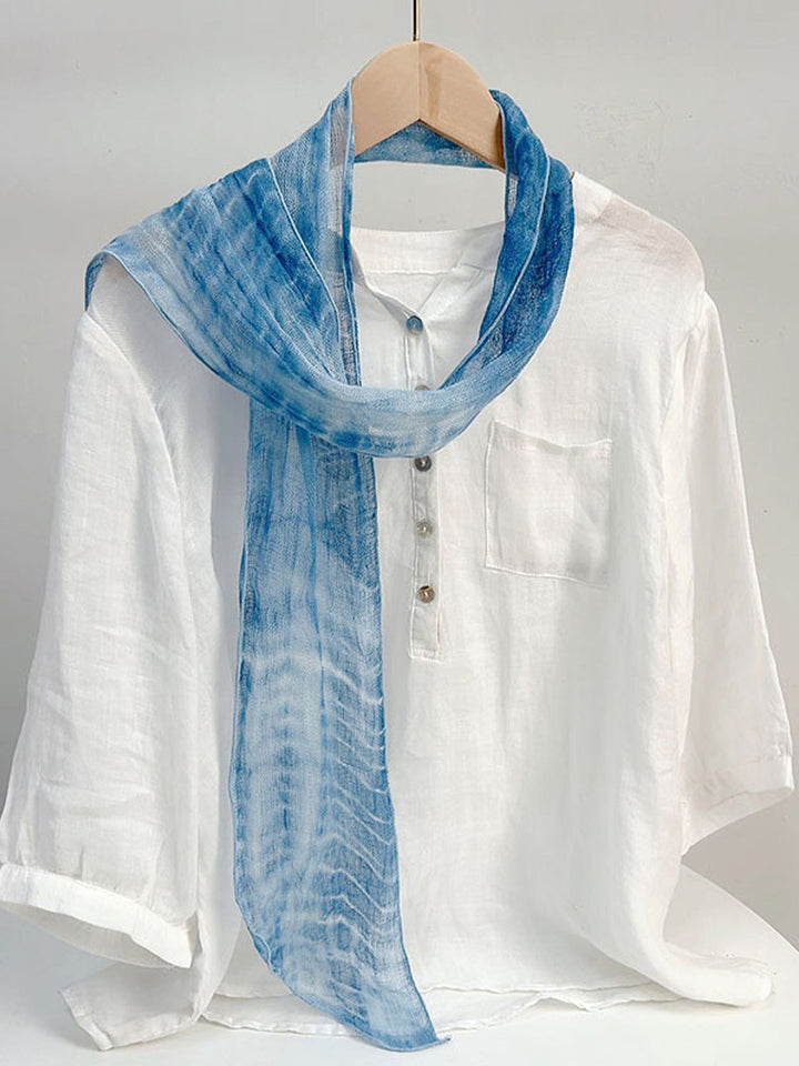 Linen scarf featuring a hand tie-dye finish in various colors, showcasing a soft and lightweight design perfect for year-round wear. 7