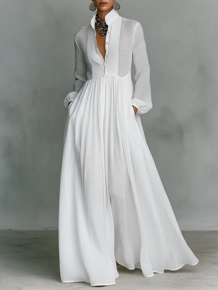 Elegant maxi dress featuring patchwork linen design, stand-up collar, and button closure, perfect for sophisticated occasions. 0