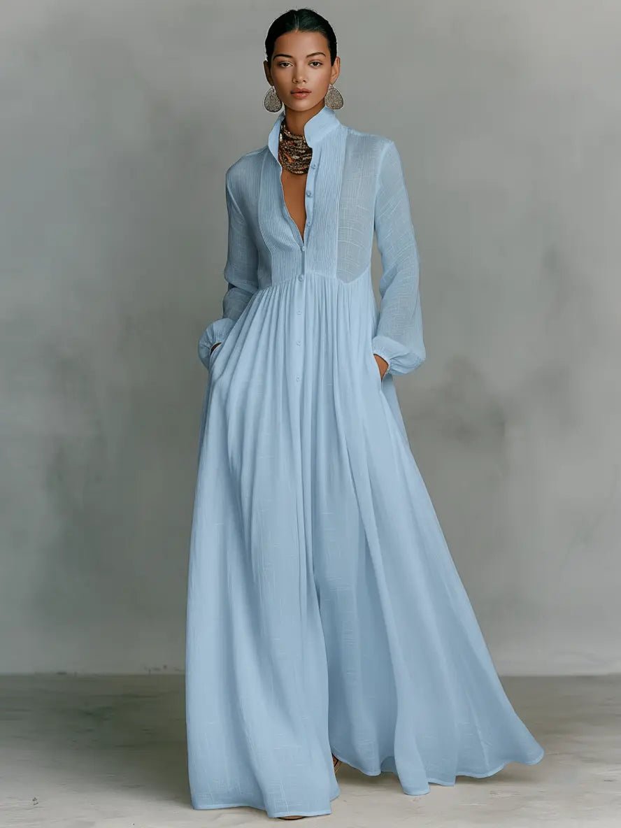 Elegant maxi dress featuring patchwork linen design, stand-up collar, and button closure, perfect for sophisticated occasions. 2