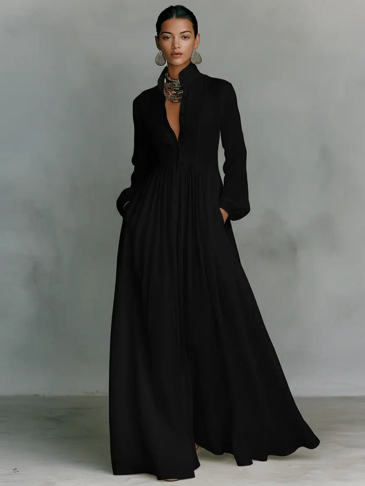 Elegant maxi dress featuring patchwork linen design, stand-up collar, and button closure, perfect for sophisticated occasions. 3