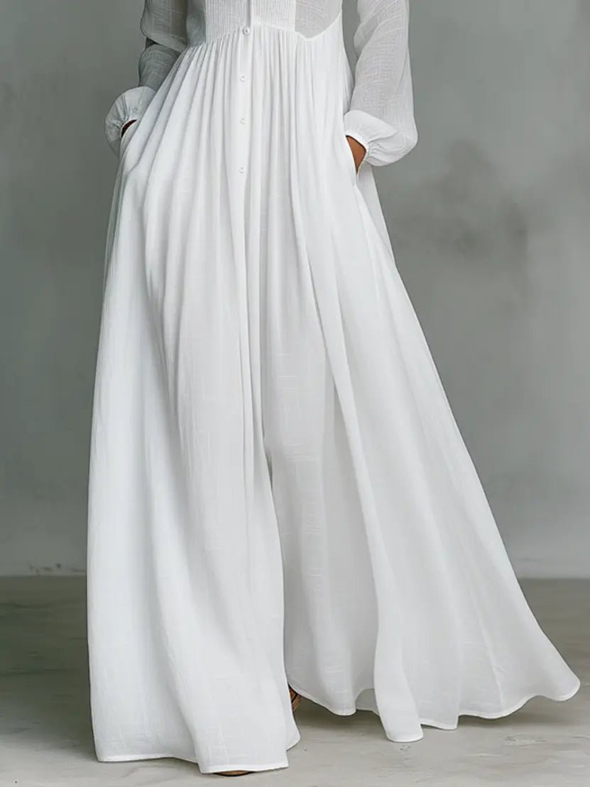 Elegant maxi dress featuring patchwork linen design, stand-up collar, and button closure, perfect for sophisticated occasions. 5