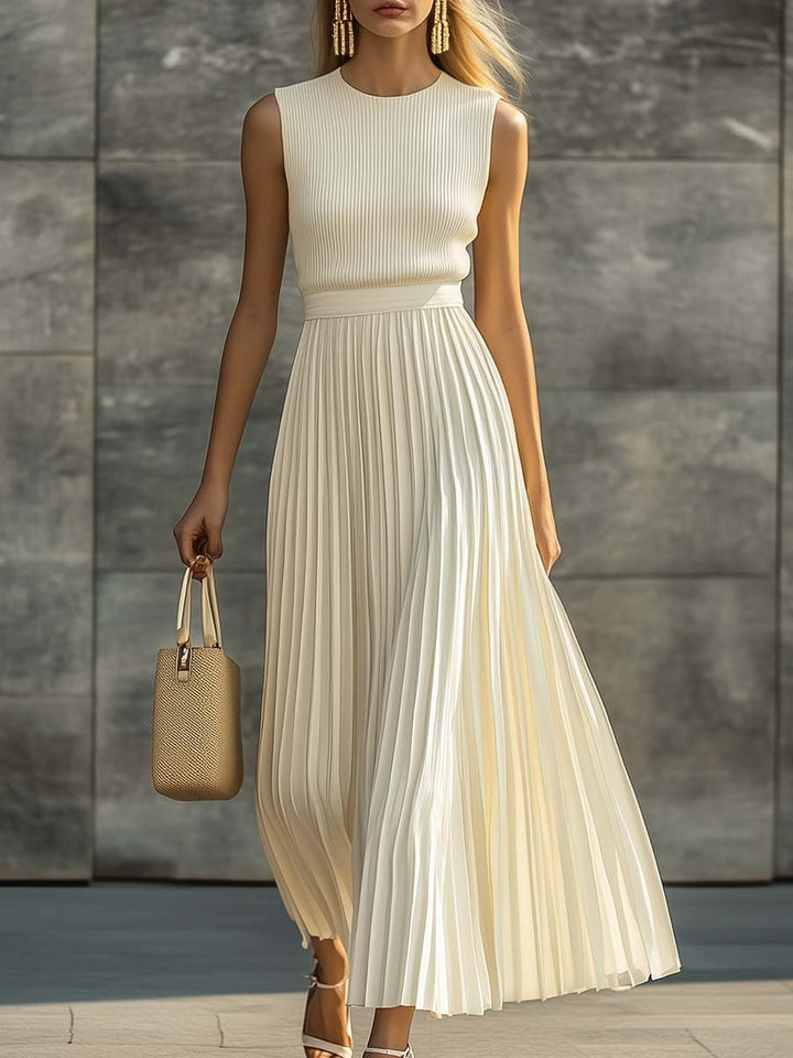 Elegant maxi dress featuring a pleated chiffon skirt and a comfortable knit top, designed with a crew neck for women. Ideal for formal occasions or casual outings 0