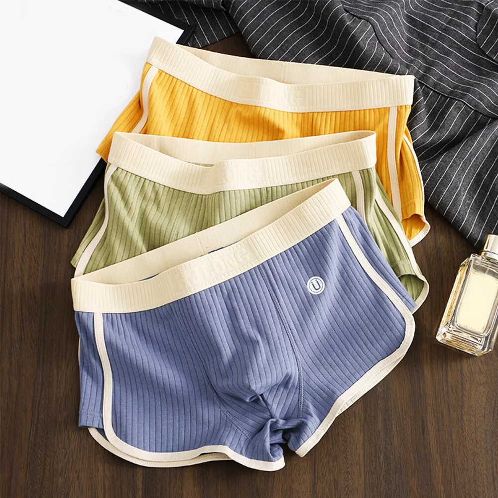 Men's briefs featuring a U-shaped pouch for enhanced support, made from ultra-soft cotton and breathable mesh, available in a convenient 3-pack. 0