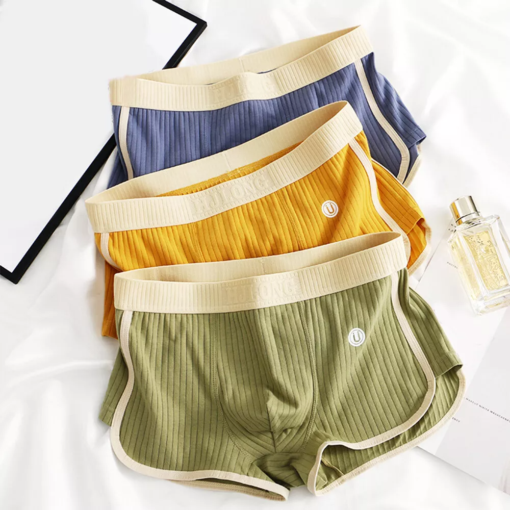 Men's briefs featuring a U-shaped pouch for enhanced support, made from ultra-soft cotton and breathable mesh, available in a convenient 3-pack. 1