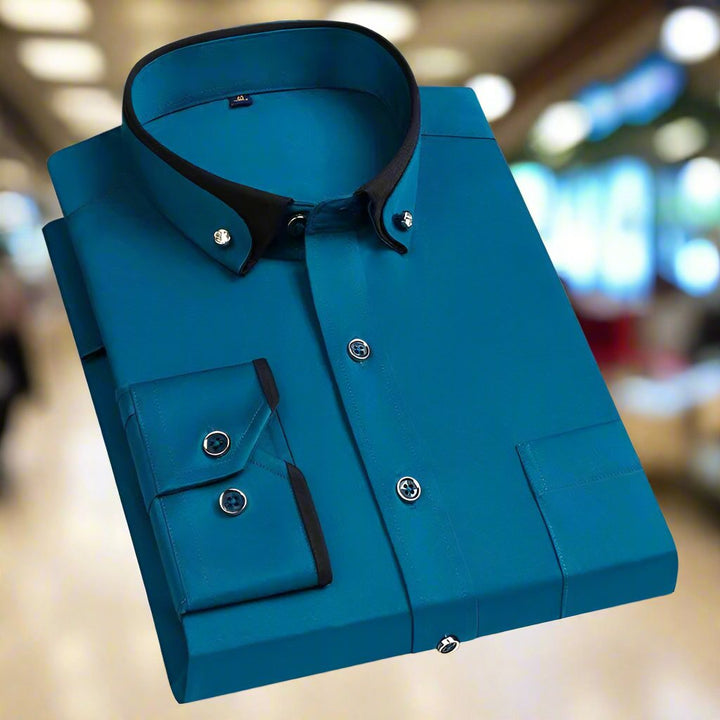 Men's classic long-sleeve dress shirt made from a comfortable cotton blend, featuring a timeless design suitable for formal and casual occasions. 2