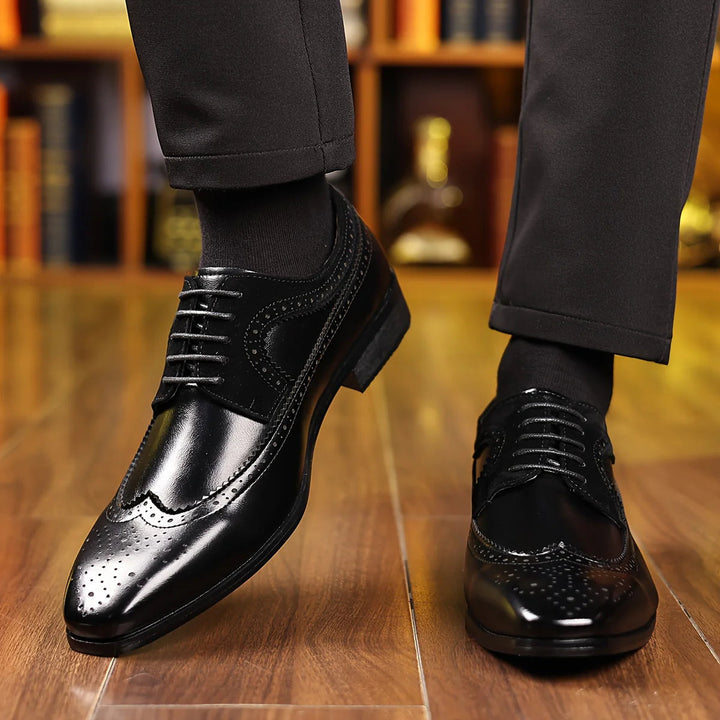 Men's black leather dress shoes featuring a sleek formal design, offering comfort and durability for any elegant occasion. 6