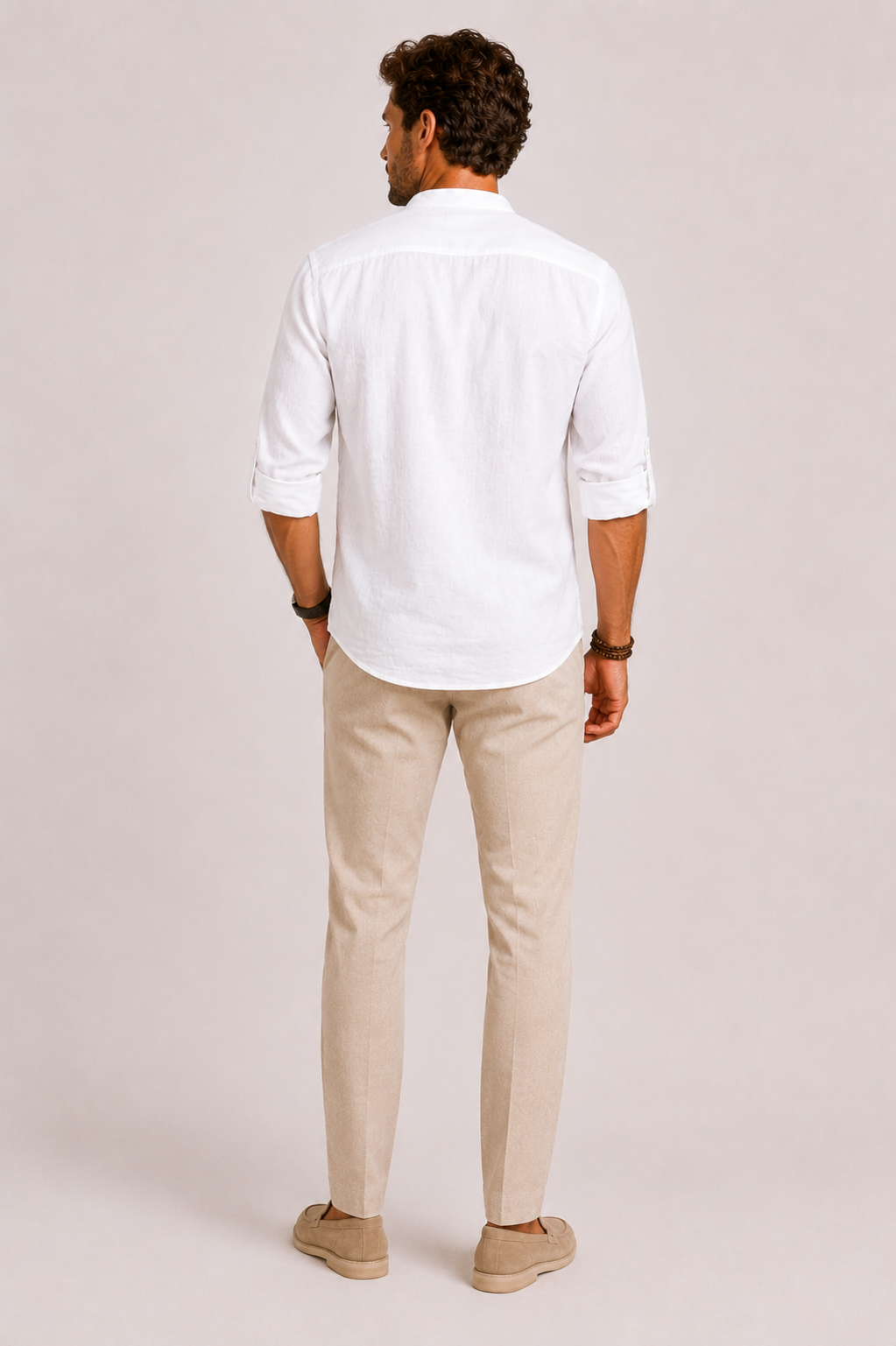 Men's white linen shirt featuring a stylish mandarin collar and roll-tab sleeves, designed for a relaxed fit and comfortable wear. 2