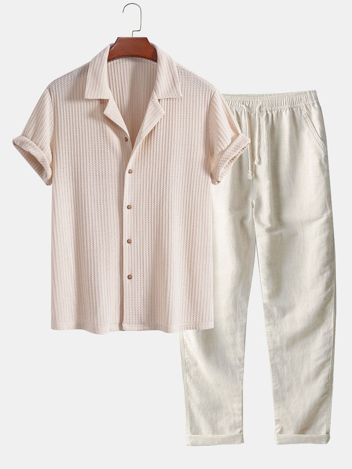 Men's outfit set featuring a textured knitted waffle shirt paired with lightweight linen pants, ideal for casual summer style. 1