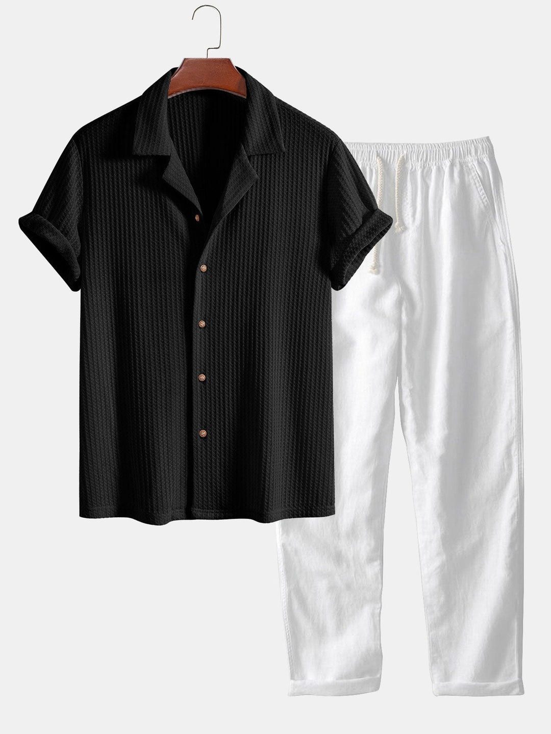 Men's outfit set featuring a textured knitted waffle shirt paired with lightweight linen pants, ideal for casual summer style. 3