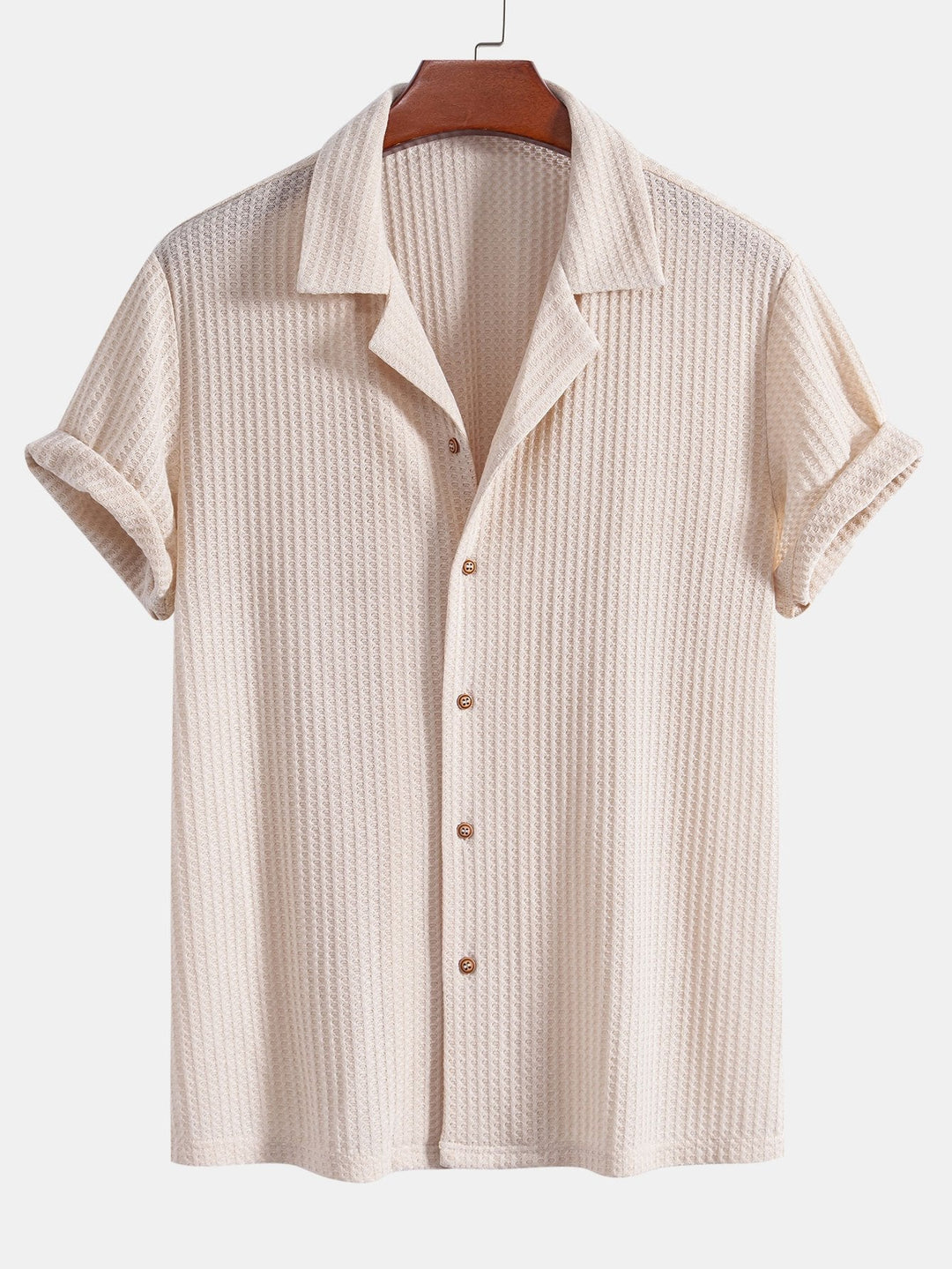 Men's outfit set featuring a textured knitted waffle shirt paired with lightweight linen pants, ideal for casual summer style. 4