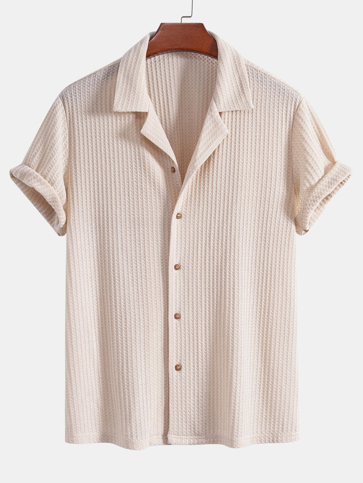 Men's outfit set featuring a textured knitted waffle shirt paired with lightweight linen pants, ideal for casual summer style. 4