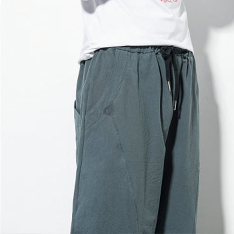 Men's casual tapered fit cotton joggers with drawstring and pockets, available in solid colors, perfect for everyday wear. 8