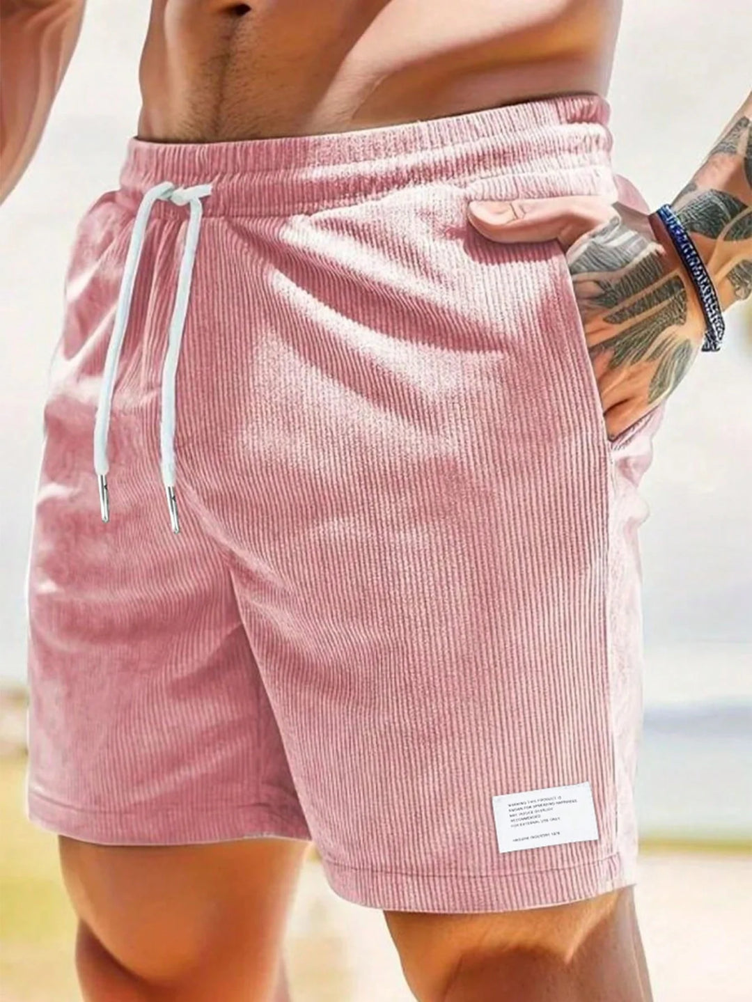 Men's shorts featuring an adjustable drawstring, designed for a casual and lightweight fit, perfect for summer comfort and outdoor activities. 10
