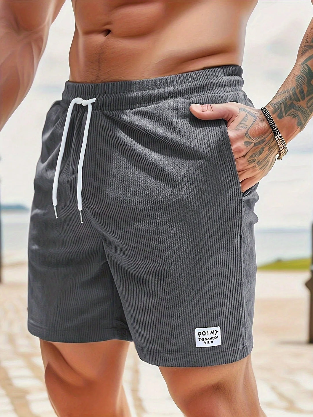 Men's shorts featuring an adjustable drawstring, designed for a casual and lightweight fit, perfect for summer comfort and outdoor activities. 11