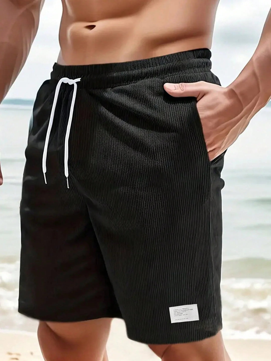 Men's shorts featuring an adjustable drawstring, designed for a casual and lightweight fit, perfect for summer comfort and outdoor activities. 8