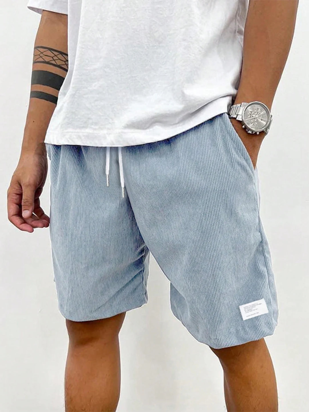 Men's shorts featuring an adjustable drawstring, designed for a casual and lightweight fit, perfect for summer comfort and outdoor activities. 9