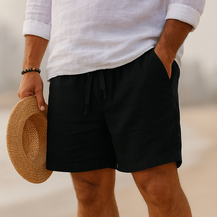 Men's relaxed fit shorts made from a breathable cotton-linen blend, perfect for summer wear. 2