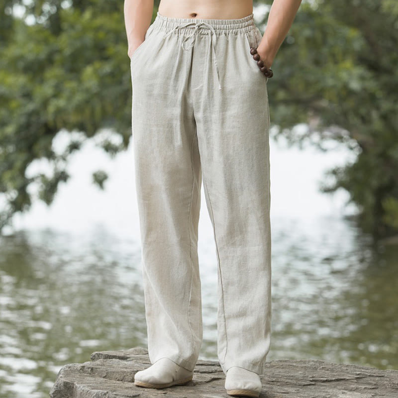 Men's wide leg pants featuring a breathable cotton linen blend, designed for a relaxed fit with convenient pockets, perfect for casual wear. 0