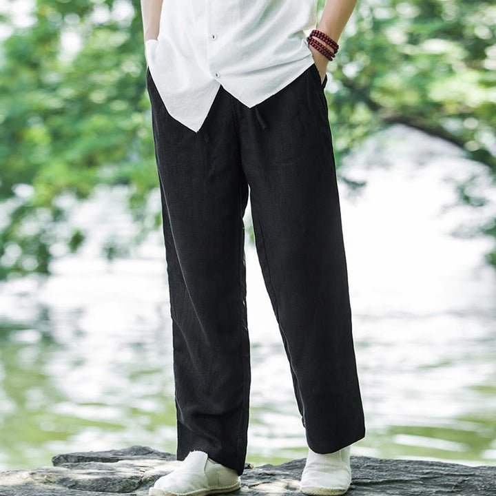 Men's wide leg pants featuring a breathable cotton linen blend, designed for a relaxed fit with convenient pockets, perfect for casual wear. 4