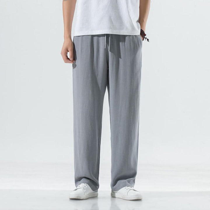 Men's wide leg pants featuring a breathable cotton linen blend, designed for a relaxed fit with convenient pockets, perfect for casual wear. 8