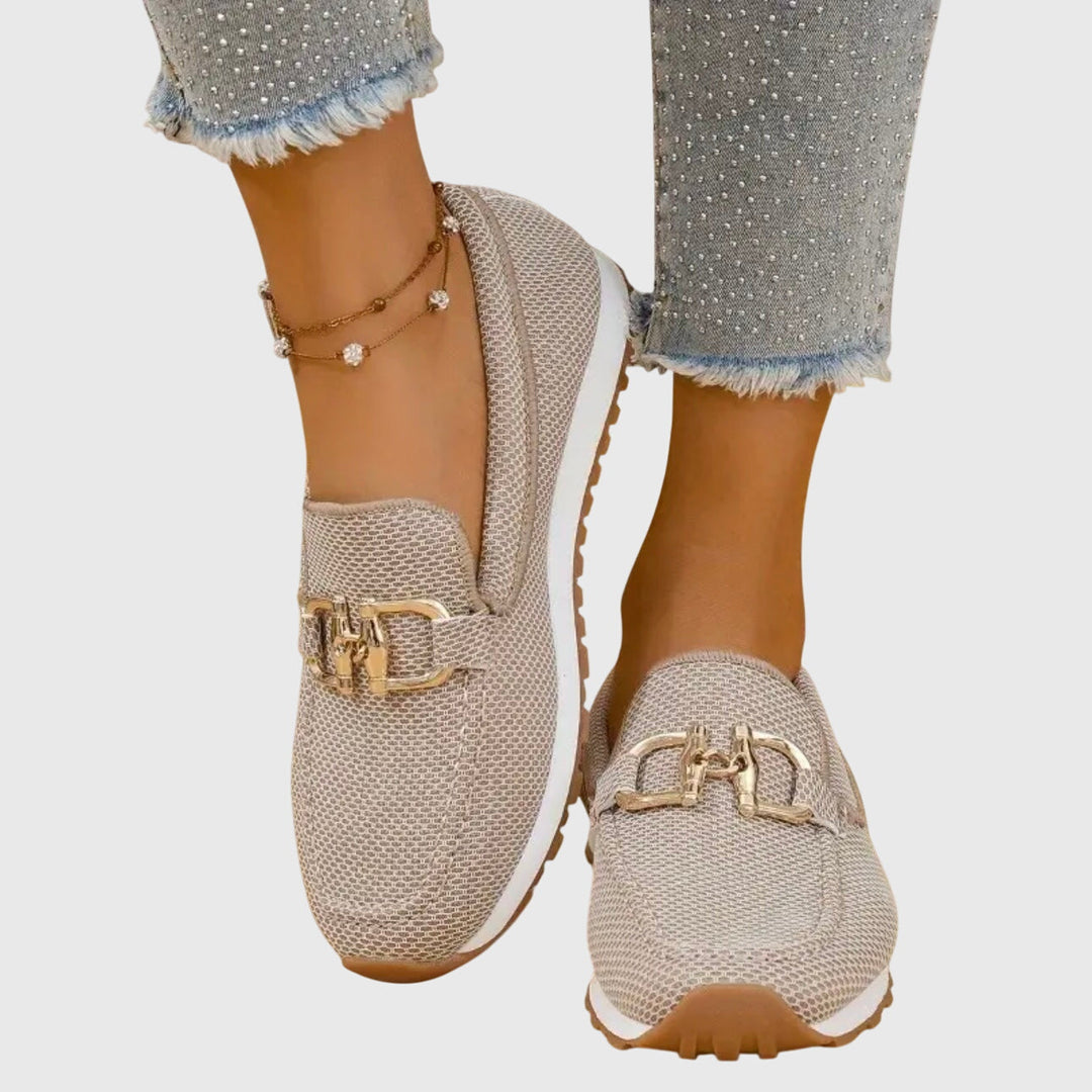 Orthopedic loafers for women featuring ergonomic support, slip-on design, and made from soft breathable material for comfort and style. 0