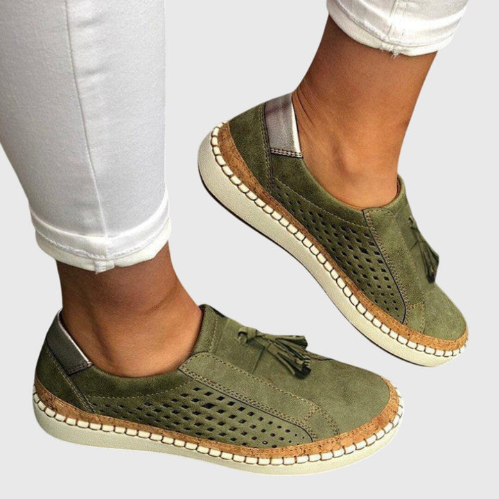 Orthopedic slip-on shoes featuring arch support, a breathable design, and a non-slip, lightweight construction for ultimate comfort. 0