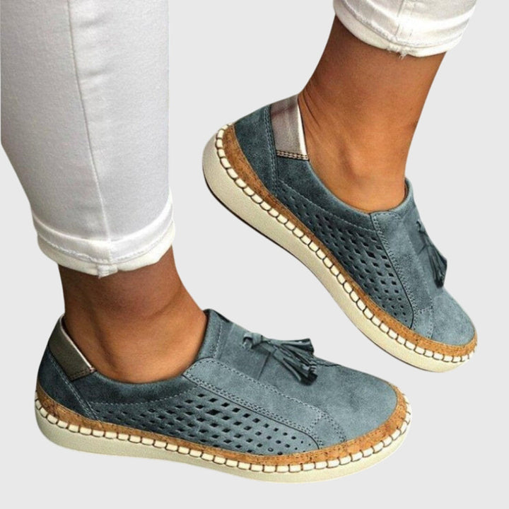 Orthopedic slip-on shoes featuring arch support, a breathable design, and a non-slip, lightweight construction for ultimate comfort. 2