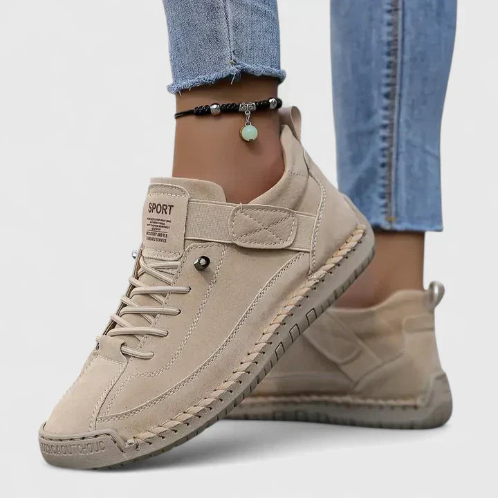 Orthopedic sneakers featuring soft cushioning and arch support, designed for comfort and everyday wear, ideal for promoting foot health. 1