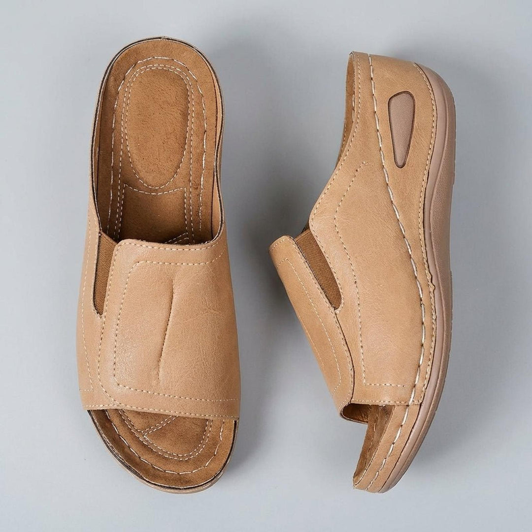 Orthopedic wedge sandals for women featuring arch support, slip-on design, and open-toe style in durable leather. 5