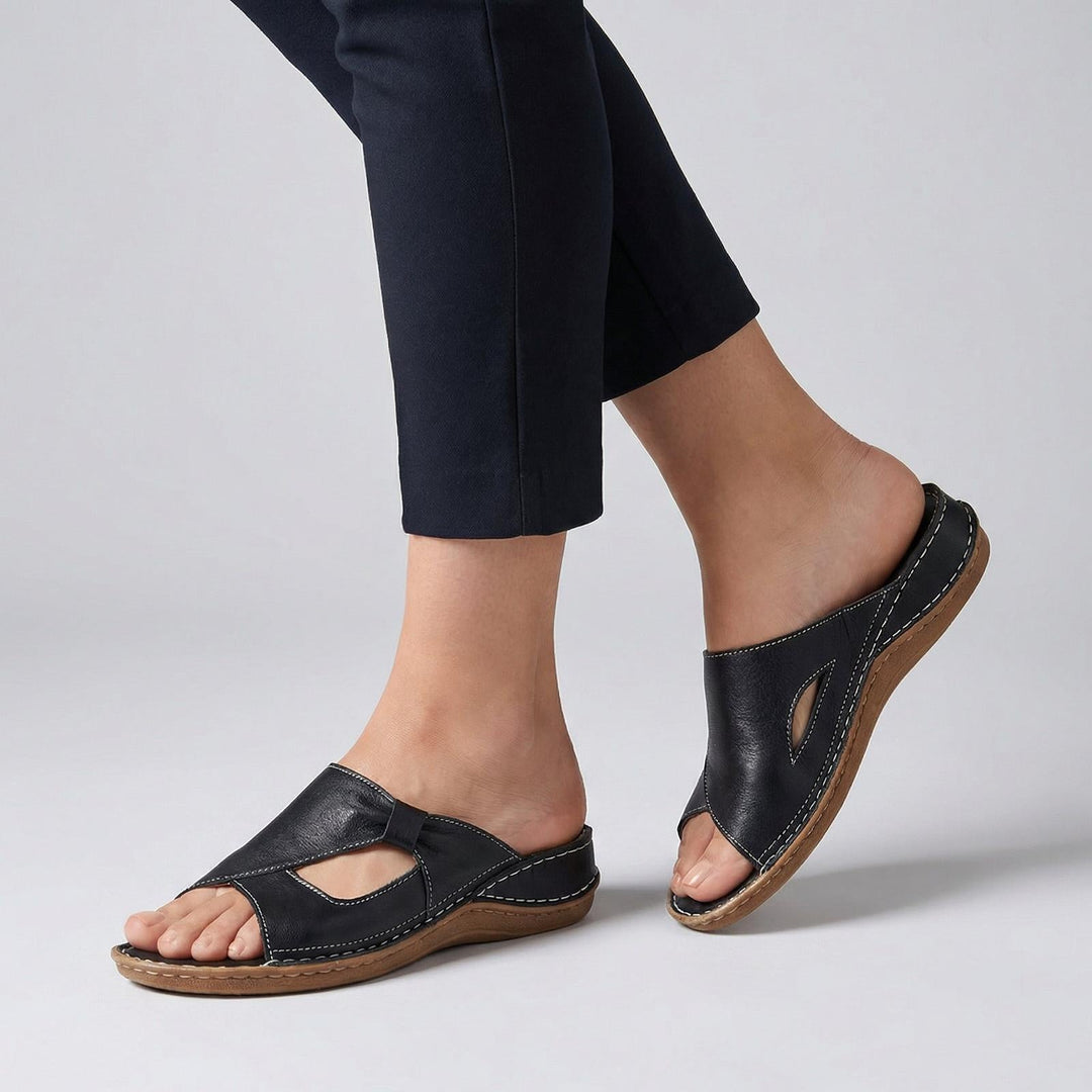 Orthopedic women's sandals featuring arch support, made of premium leather with a slip-on open toe design, ideal for comfort and style. 0