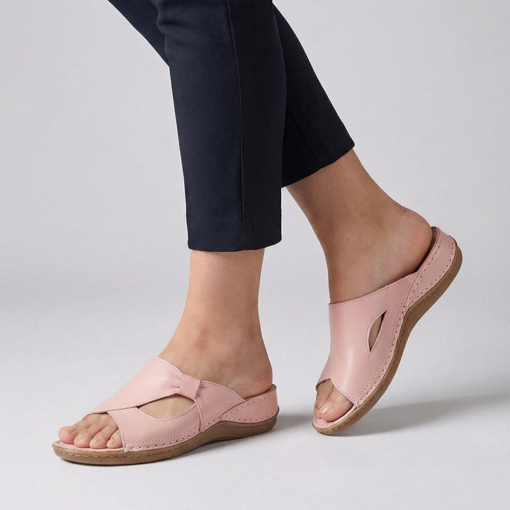 Orthopedic women's sandals featuring arch support, made of premium leather with a slip-on open toe design, ideal for comfort and style. 2