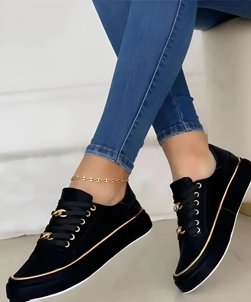 Orthopedic women's sneakers featuring shock-absorbing soles and stylish golden accents, perfect for comfort and fashionable everyday wear. 1