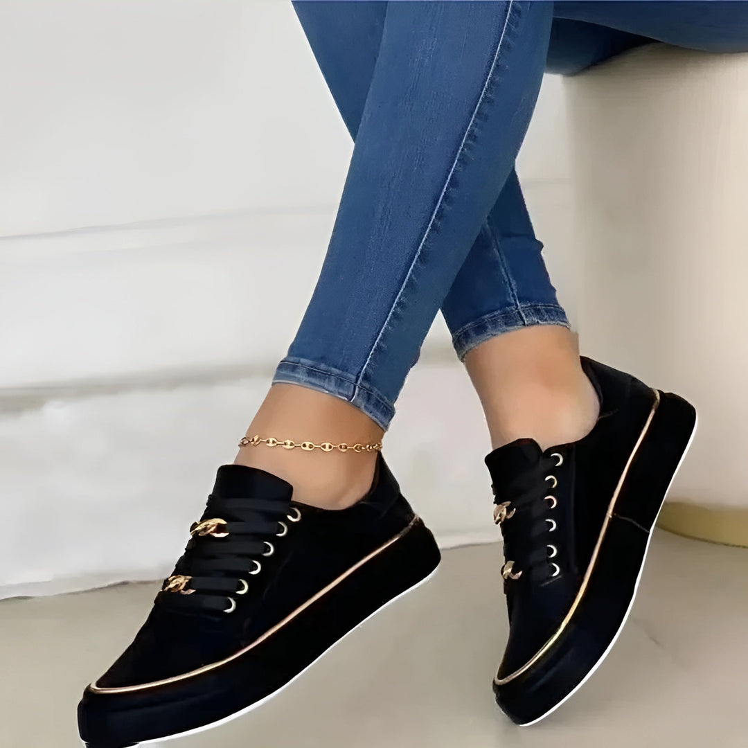Orthopedic women's sneakers featuring shock-absorbing soles and stylish golden accents, perfect for comfort and fashionable everyday wear. 5