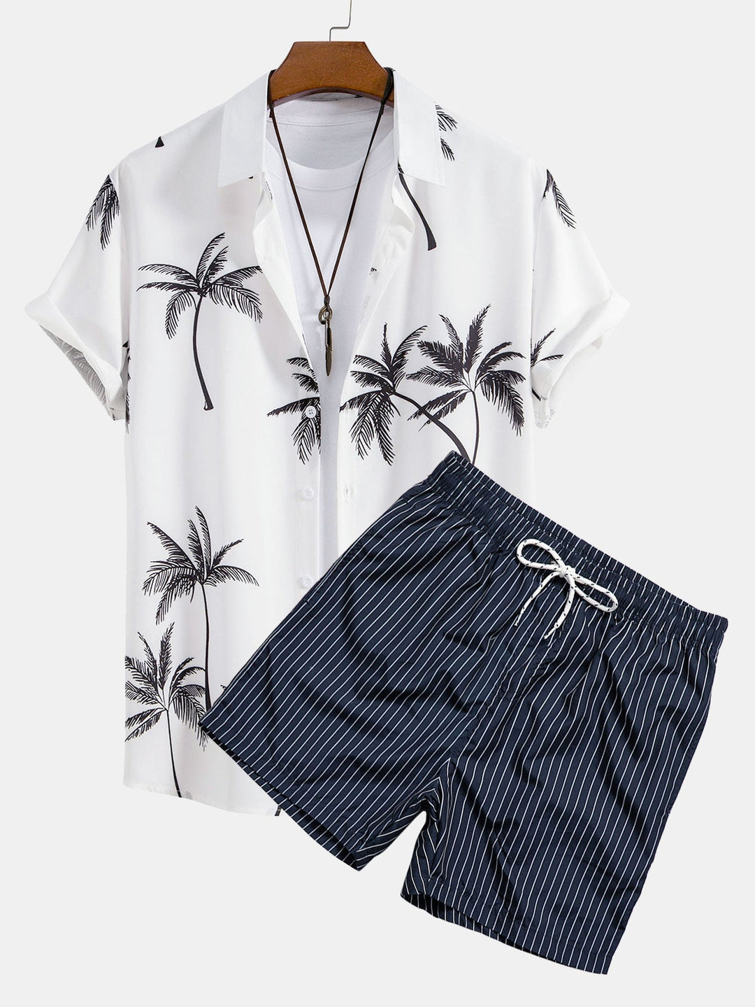 Palm tree print shirt paired with striped swim shorts set, made from 100% polyester, designed for a regular fit, perfect for summer beachwear. 0