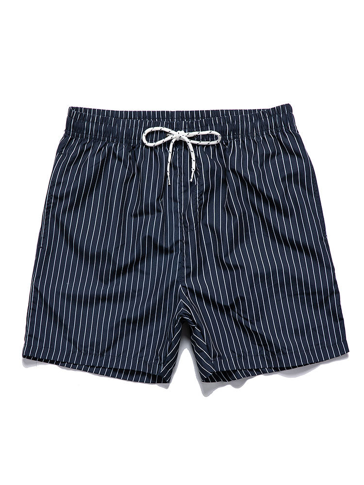 Palm tree print shirt paired with striped swim shorts set, made from 100% polyester, designed for a regular fit, perfect for summer beachwear. 3