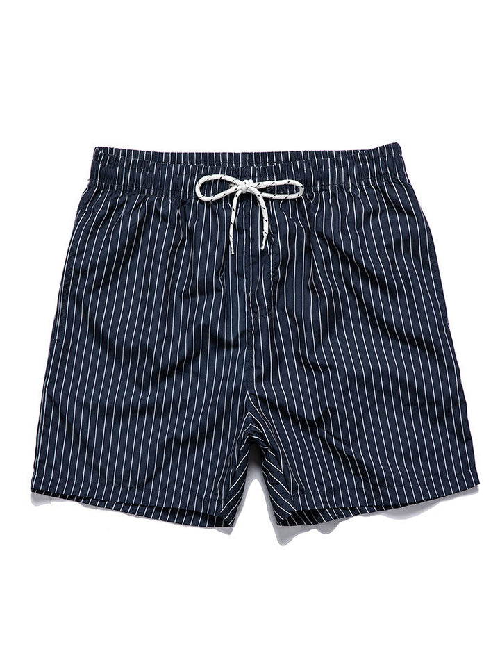 Palm tree print shirt paired with striped swim shorts set, made from 100% polyester, designed for a regular fit, perfect for summer beachwear. 3