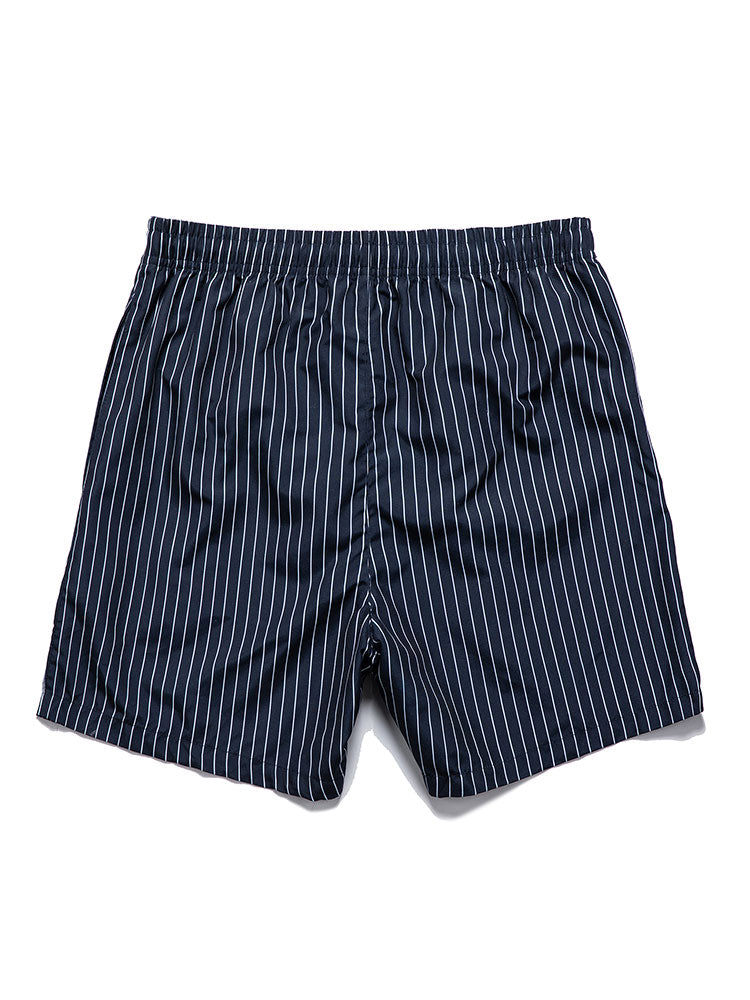 Palm tree print shirt paired with striped swim shorts set, made from 100% polyester, designed for a regular fit, perfect for summer beachwear. 4