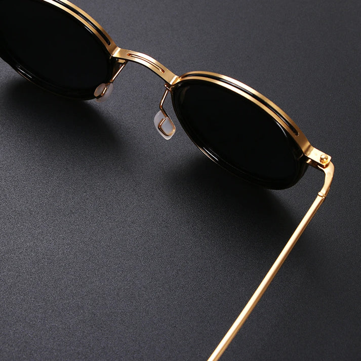 Polarized sunglasses featuring UV400 protection, designed with a lightweight modern aesthetic, perfect for outdoor activities. 4