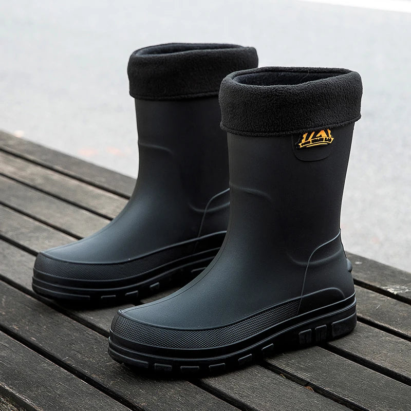 Men's waterproof rain boots featuring a slip-resistant sole, designed with a mid-calf height for optimal protection and comfort in wet conditions. 3