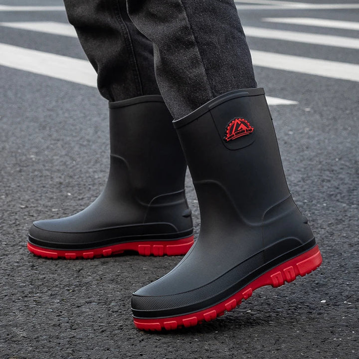 Men's waterproof rain boots featuring a slip-resistant sole, designed with a mid-calf height for optimal protection and comfort in wet conditions. 4