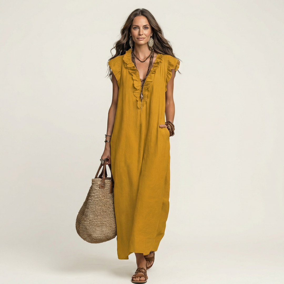Ruffle V-Neck Maxi Dress in white made from a cotton linen blend, featuring side pockets and a relaxed fit, perfect for casual summer outings. 11