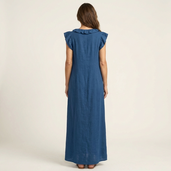 Ruffle V-Neck Maxi Dress in white made from a cotton linen blend, featuring side pockets and a relaxed fit, perfect for casual summer outings. 7