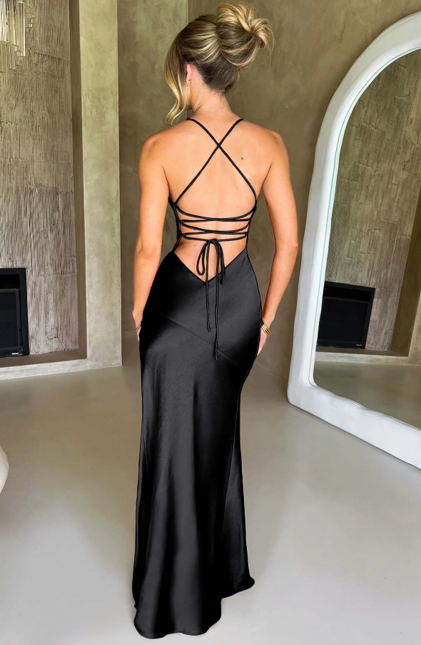 Satin halter neck maxi dress in butter yellow featuring a thigh-high slit, perfect for elegant evening events and summer occasions. 6