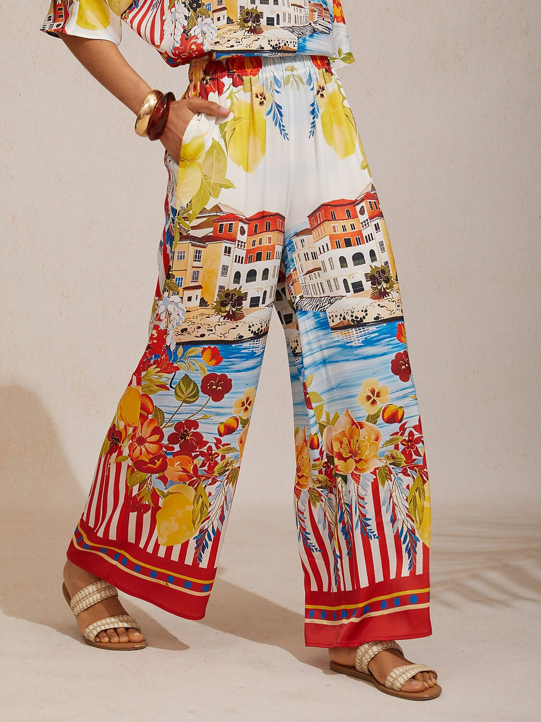Satin wide leg pants featuring a floral motif and elastic waistband, designed for a flowy relaxed fit, perfect for women's casual and chic outfits. 10