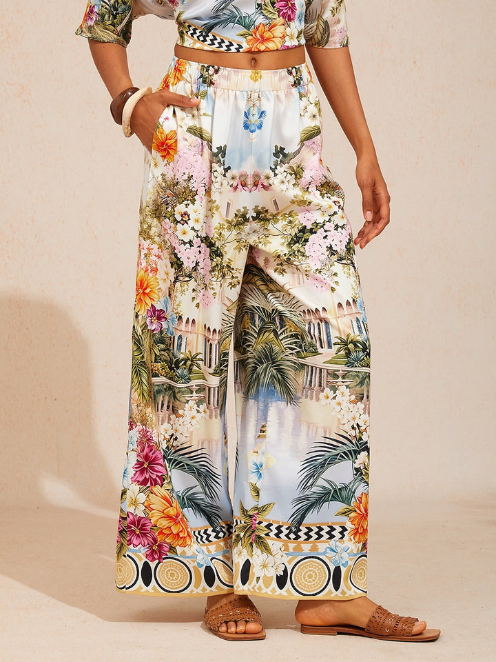 Satin wide leg pants featuring a floral motif and elastic waistband, designed for a flowy relaxed fit, perfect for women's casual and chic outfits. 11