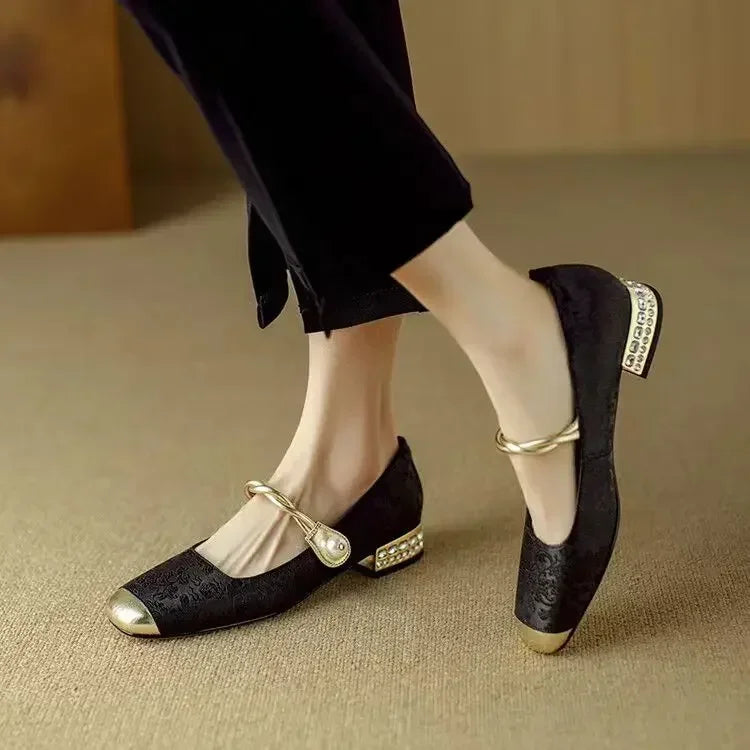 Elegant silk-like evening pumps featuring a pearl strap and embellished square heel, perfect for formal occasions. 6