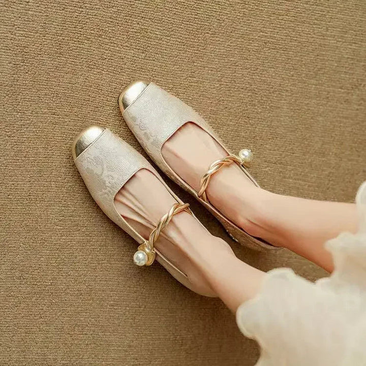 Elegant silk-like evening pumps featuring a pearl strap and embellished square heel, perfect for formal occasions. 9