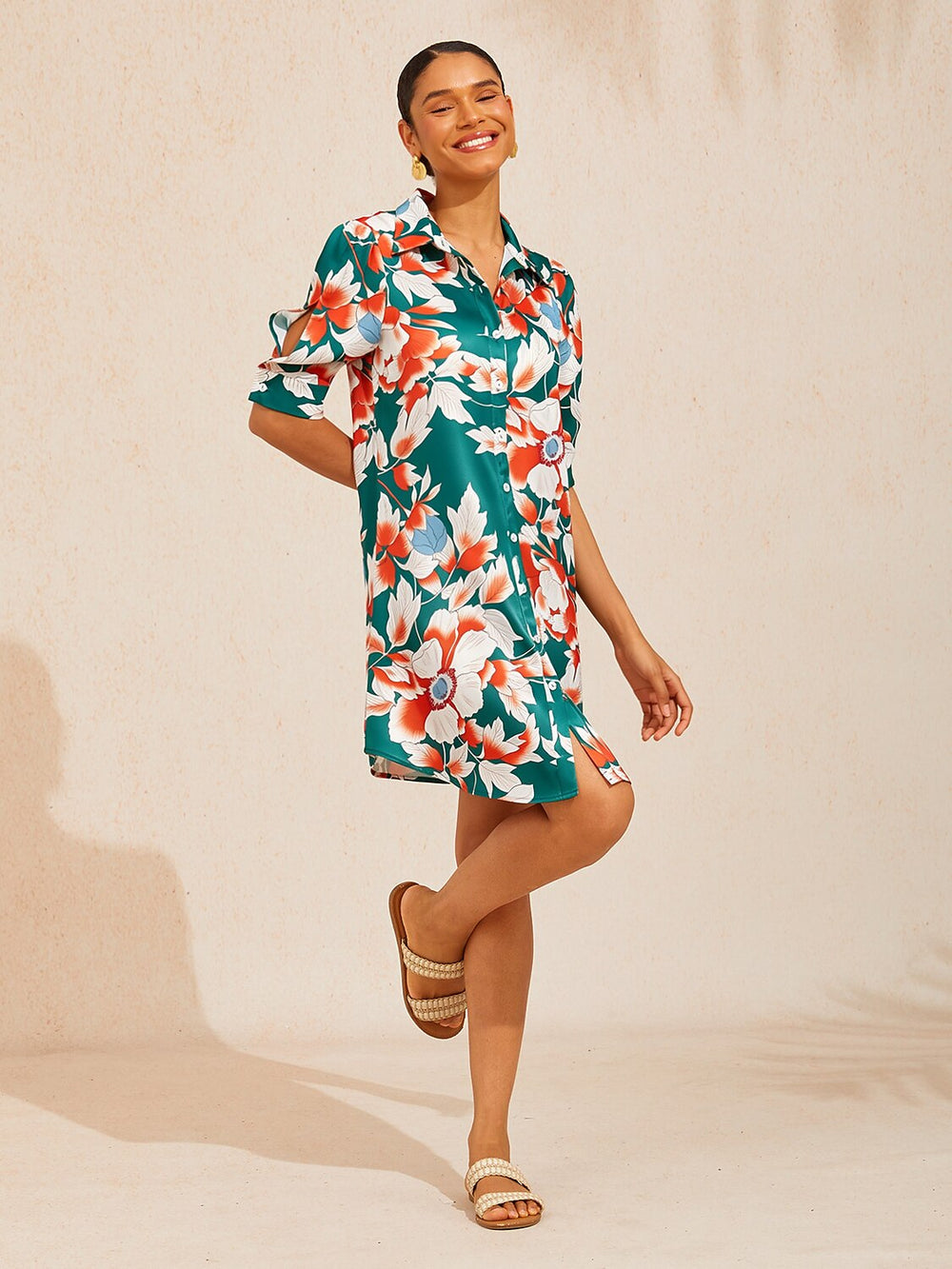 Silky satin shirt dress for women featuring a vibrant floral design in deep green hibiscus, offering a relaxed fit and tropical style perfect for summer outings. 1