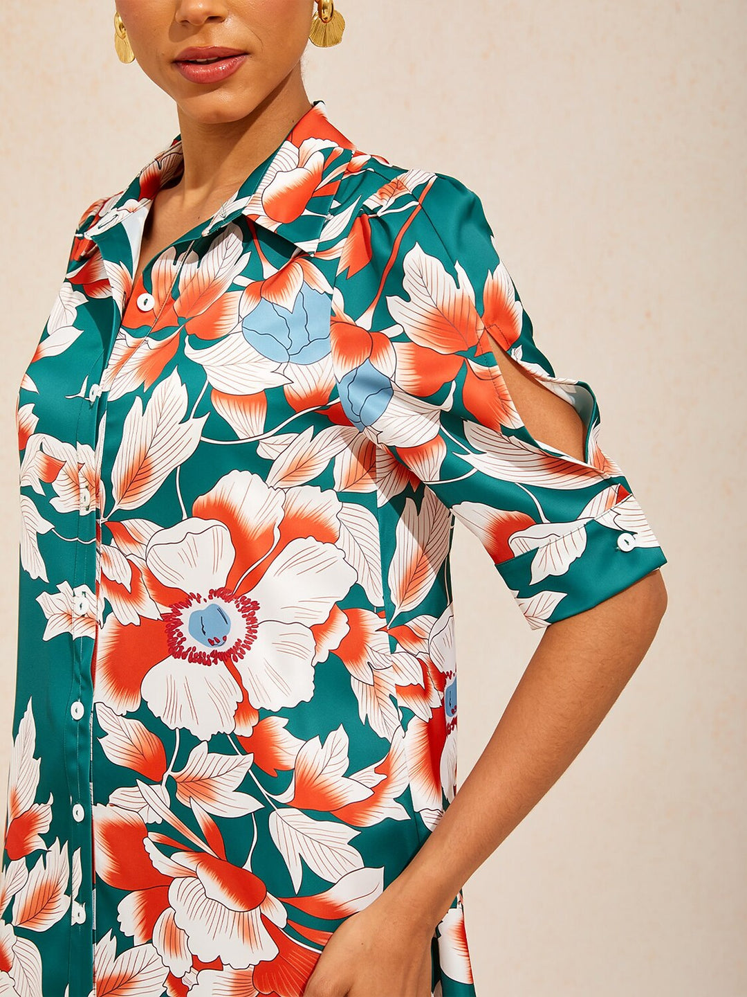 Silky satin shirt dress for women featuring a vibrant floral design in deep green hibiscus, offering a relaxed fit and tropical style perfect for summer outings. 6