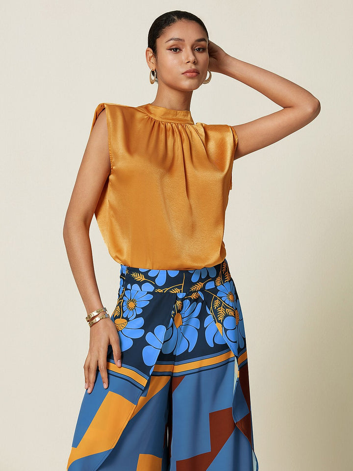 Silky satin sleeveless top with mock neck, featuring an elegant design for ladies, ideal for resort dinners and weekend brunches. 11